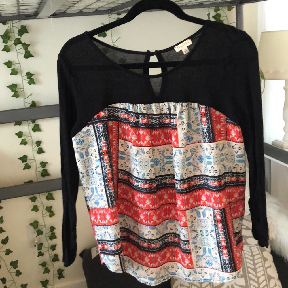 black and patterned sweater/ top